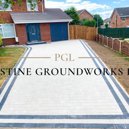 Light grey block paved driveway with charcoal stripes