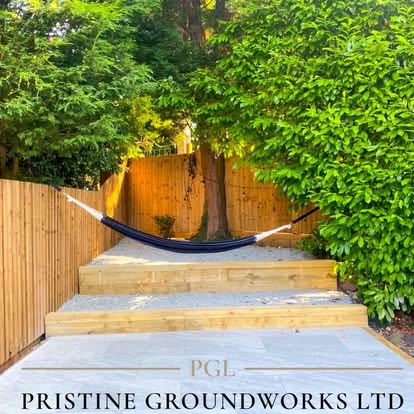 Timber sleeper steps with a hammock strung between trees