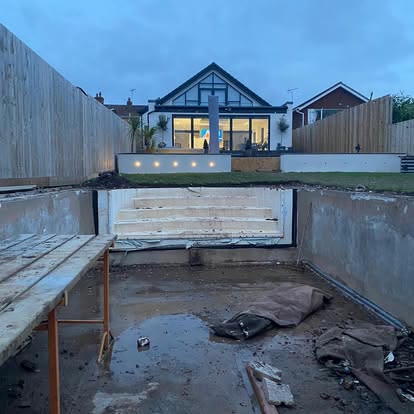 Swimming Pool Converted into a Sunken Fire Pit Lounge, photo 1 of 4